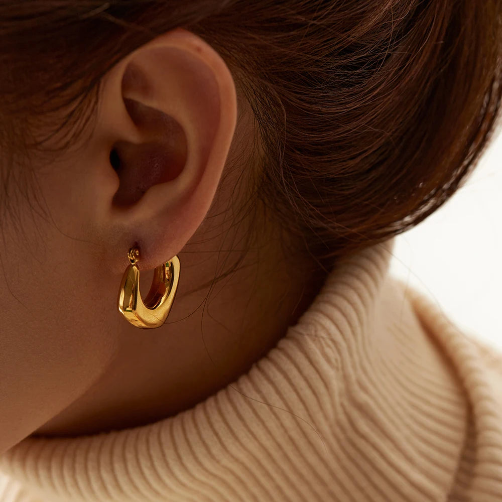 Pendientes grandes de acero inoxidable con forma de gota de agua